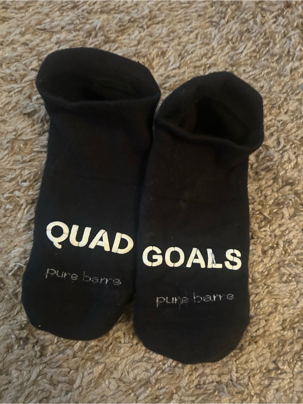 Pure Barre Black No-Show Athletic Socks with "QUAD GOALS" Text